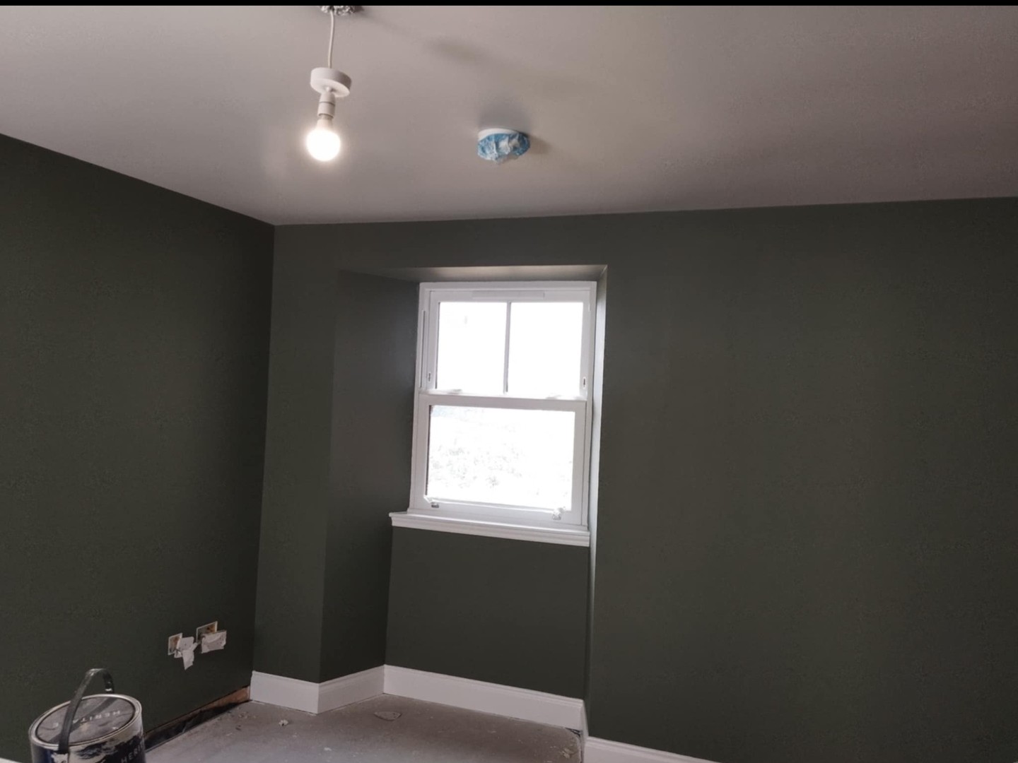 Job A after: bedroom painted deep green