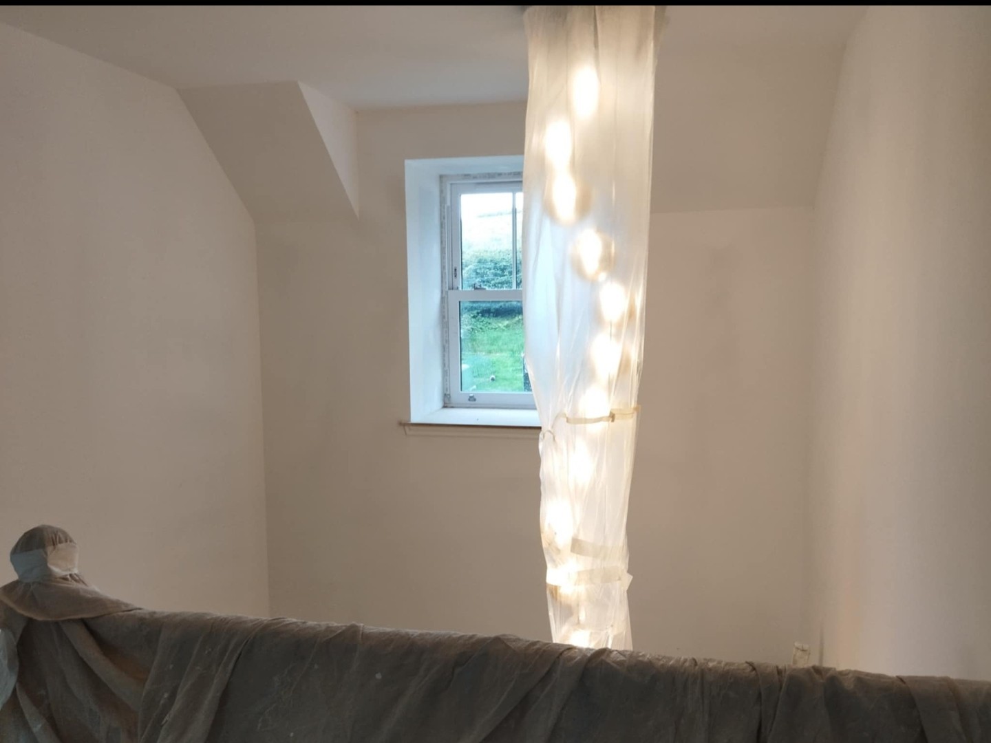 Job C view 2 before: plaster stairwell with pendant lights