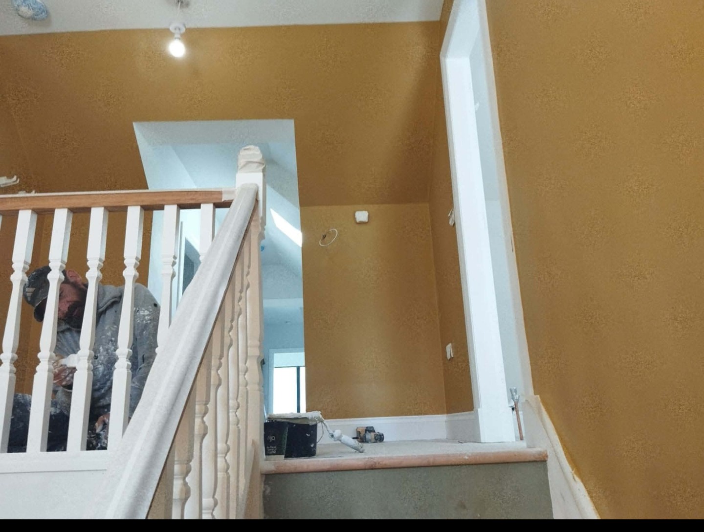 Job C view 1 after: stairwell painted ochre