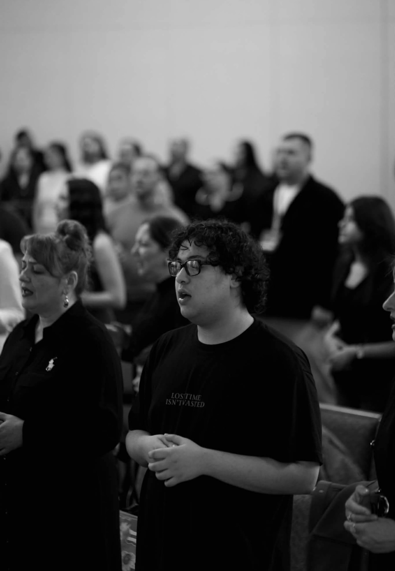 Black and white close-up of Samuels at a conference